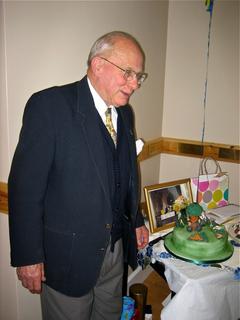 A+thoughtful+Peter+with+Birthday+cake