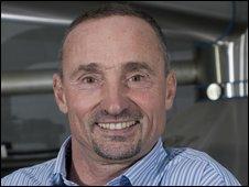 JONATHAN PATRICK ADAIR ADNAMS OBE (S65-73)